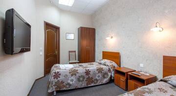 Фото номера Двухместный номер эконом-класса с 2 отдельными кроватями и общей ванной комнатой Гостиница Самара Люкс г. Самара 6