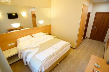 Фото номера  стандарт с 2 -х кроватью Гостевой дом Welcome Inn г. Самара 6