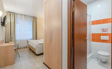 Фото номера  стандарт с 2 -х кроватью Гостевой дом Welcome Inn г. Самара 3