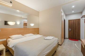Фото номера  стандарт с 2 -х кроватью Гостевой дом Welcome Inn г. Самара 7