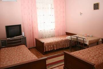 Фото номера Стандарт Трехместный Гостиница Теплый Очаг г. Самара 2